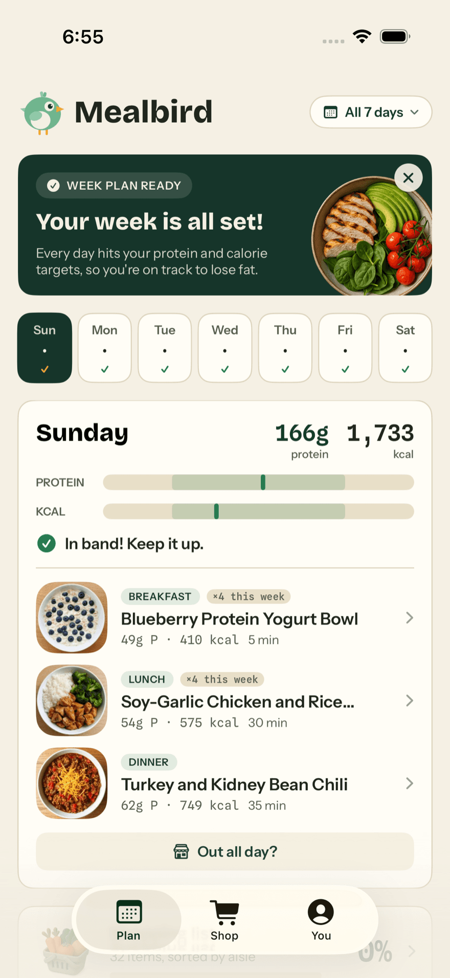 The Mealbird home screen: a “Week plan ready” banner reading “Your week is all set! Every day hits your protein and calorie targets”, a strip of seven checked days, and Sunday at 166g protein and 1,733 kcal, in band, with its three meals as photos